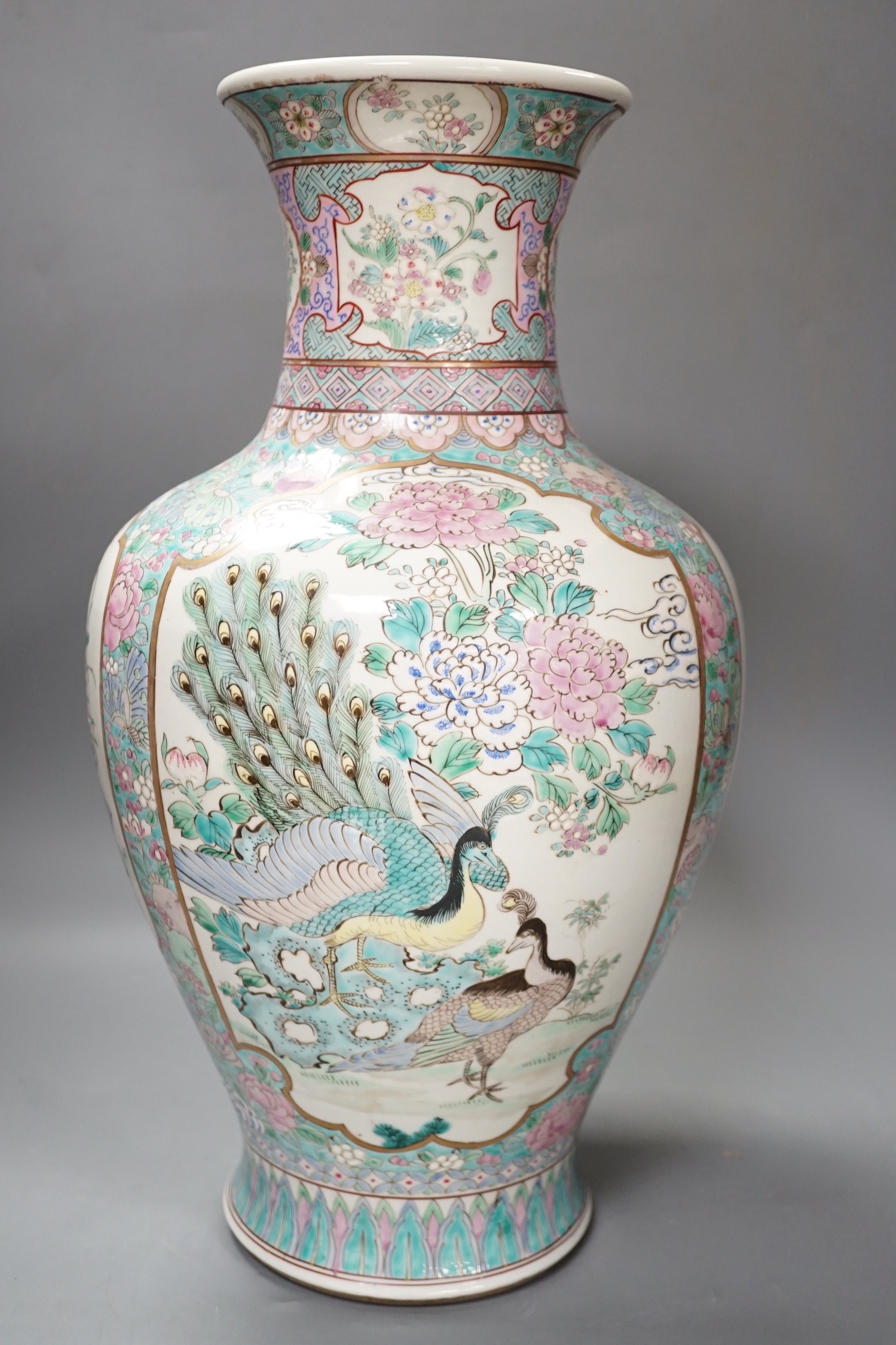 A Japanese famille rose ‘peacock’ vase circa 1900. 45cm